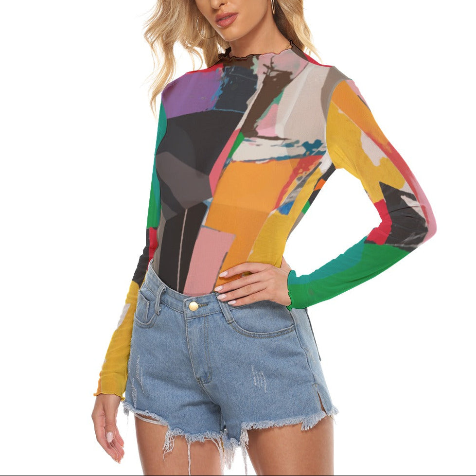 Woman wearing a colorful long-sleeve top and denim shorts on a white background