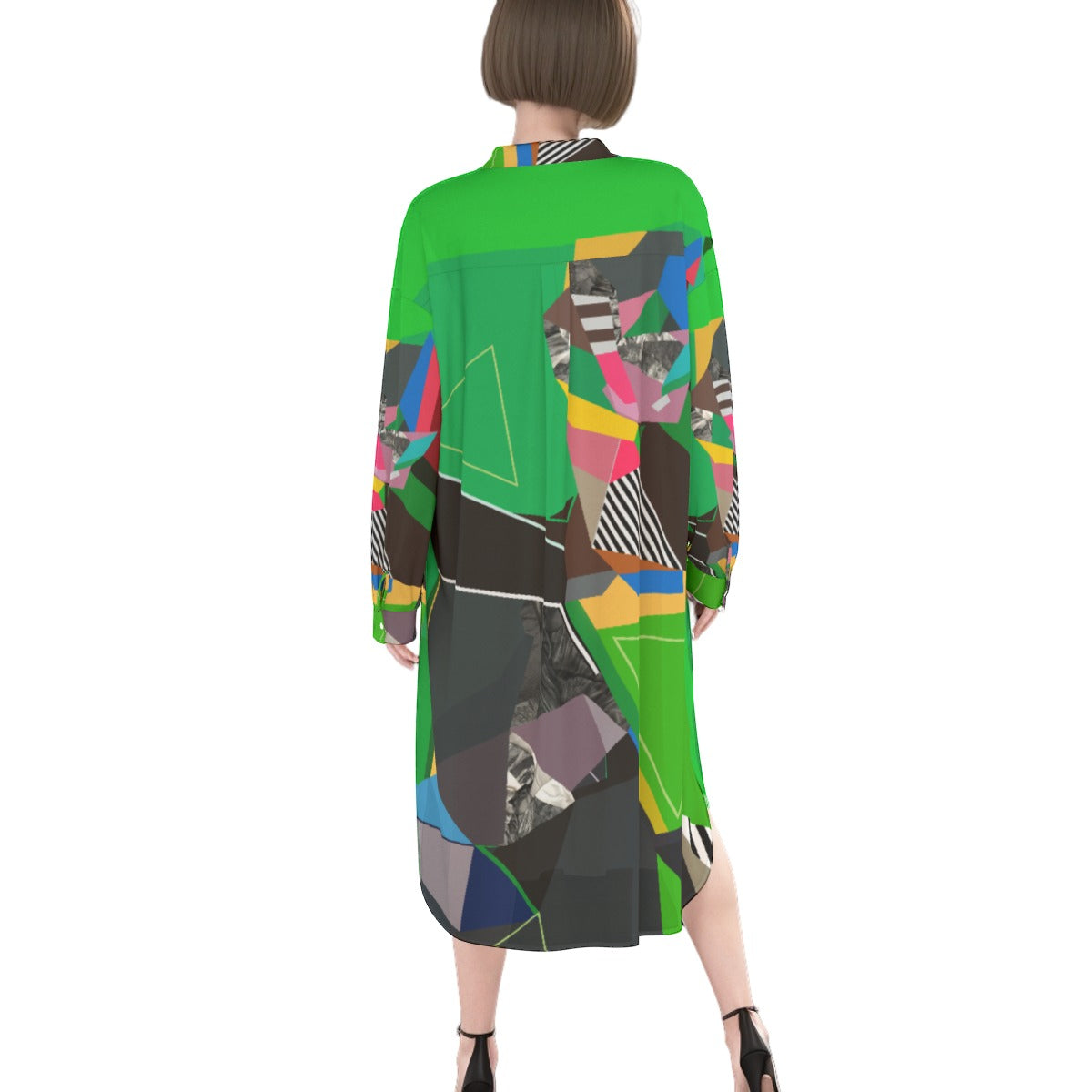 Woman wearing a colorful, patterned dress on a white background