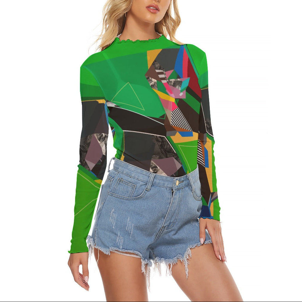 Woman wearing a colorful geometric-patterned top and denim shorts on a white background