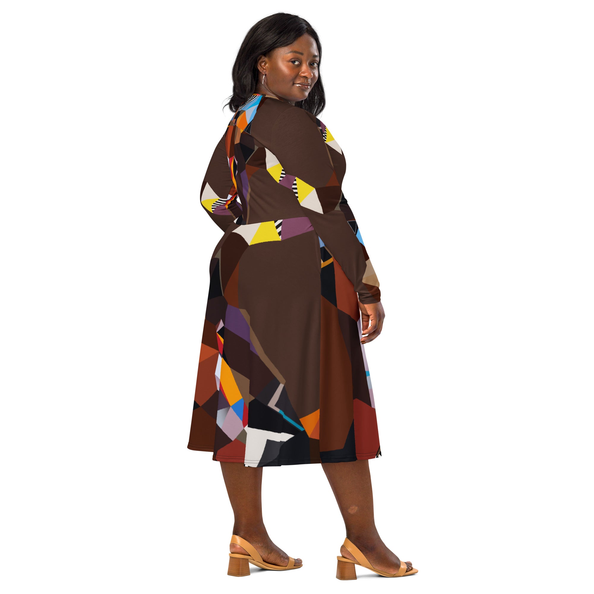Side view of a brown geometric artistic midi dress with long sleeves, functional pockets, and flowy skirt, contemporary statement dress for women