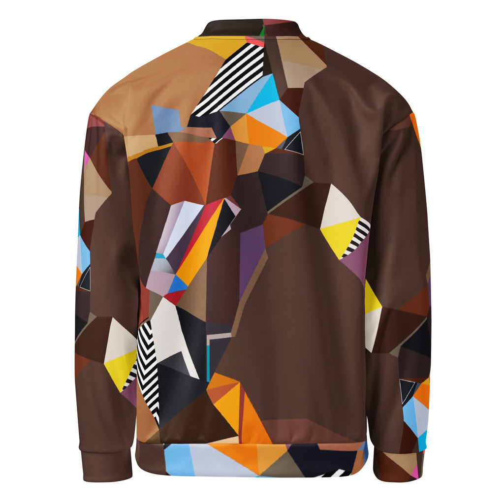 Back view of a man wearing a brown geometric-patterned artistic bomber jacket, modern statement streetwear