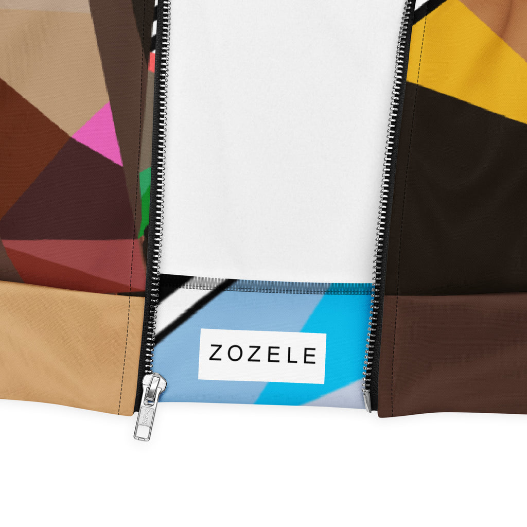 Close-up of geometric pattern detail on a colorful brown men’s bomber jacket