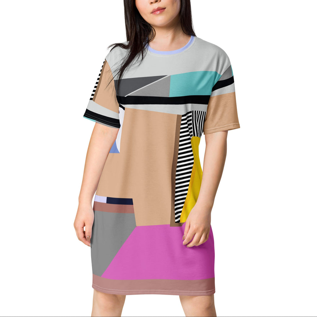 Woman model in colorful pink colorblock t-shirt mini dress with black and white stripes, perfect casual spring party look, birthday party outfit, and stylish event wear.
