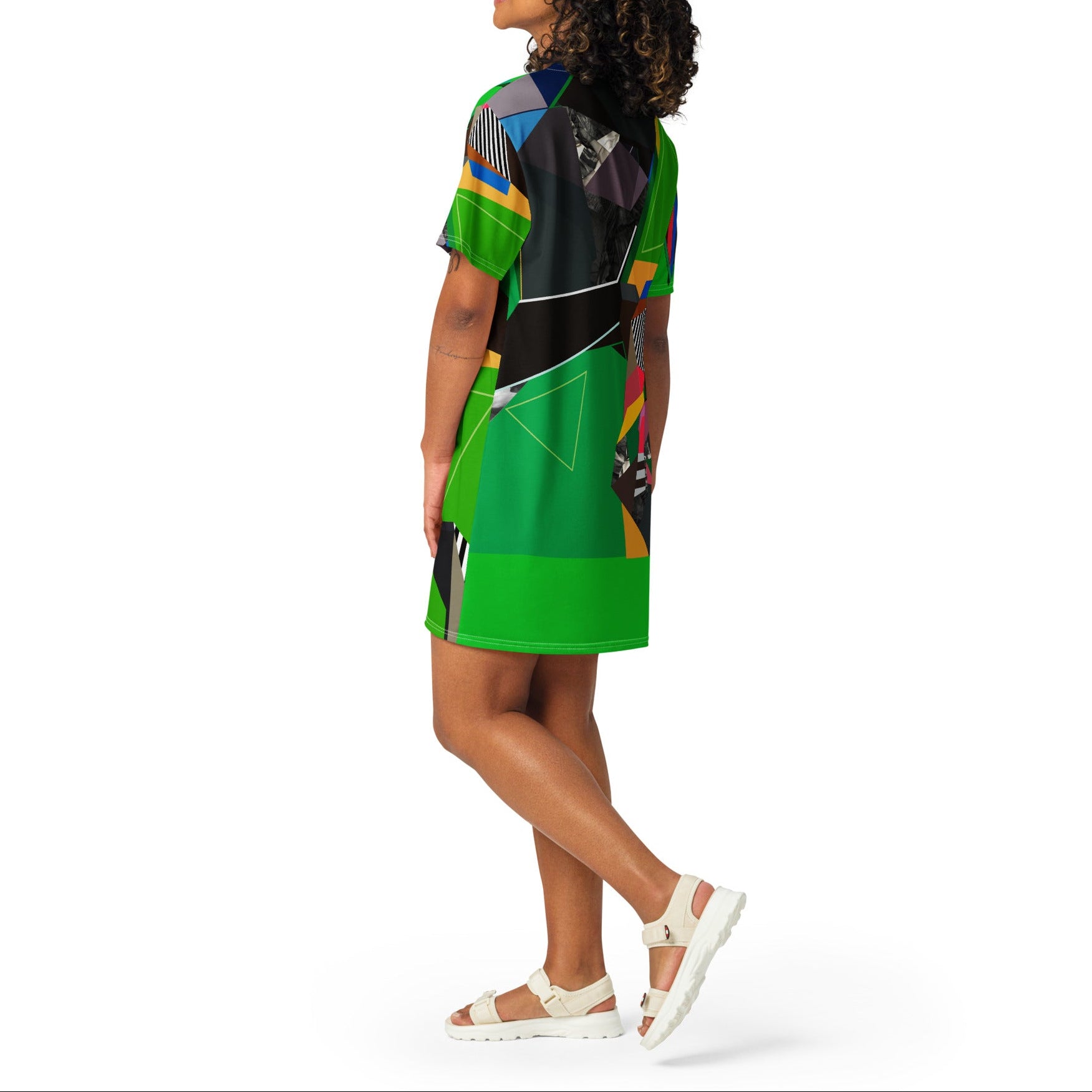 Woman modeling green abstract print tee dress, modern casual short sleeve street style fashion, comfortable everyday outfit